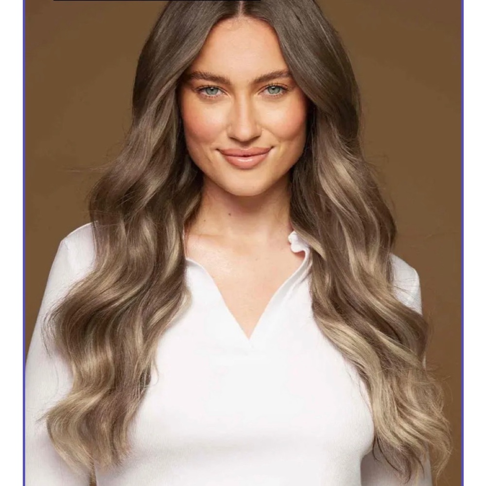 Halo brown to blonde balayage hair extensions. Long. Worn once to work.